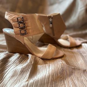 Matte pink leather. Asymmetrical ankle cuff with three buckles. 3” heel.